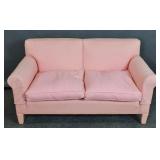 Pink upholstered settee