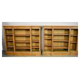 Pair of carved walnut open bookshelves
