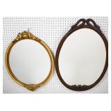 2 Oval framed mirrors