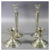 Group of sterling silver weighted candlesticks