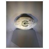 2008 stamped on autographed team football