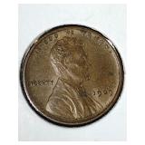 three 1909 VDB Lincoln Wheat penny coins