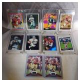 10 football cards including Butler, Aikman, Favre,