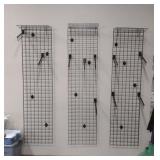 3 black rack clothes wall mounts - buyer must