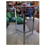 Circular free standing adjustable clothing rack -