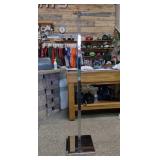 T clothing rack - 2 adjustable arms - base is 14