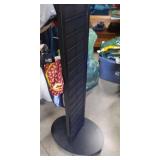black single display rack with hooks on wheels