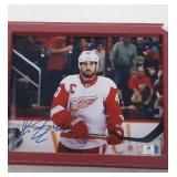 autographed Henrik Zetterberg framed 9x11 photo