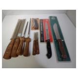 Differnt Legths of Kitchen Knives and a Pocket Kni