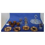 4 copper tea cups, 4 glass inserts, 4 saucers