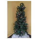 5 ft Christmas tree on stand with string of lights