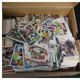 shoe box full of misc baseball and football cards