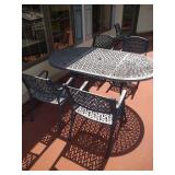 metal patio table, 6 chairs and umbrella stand