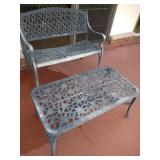 metal patio bench, table and birdbath