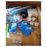 contents of drawer including batteries and