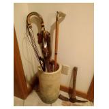 tall stoneware, walking canes, rug beater, & ax