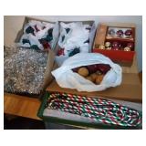 large Christmas ornaments, glass candy canes, and
