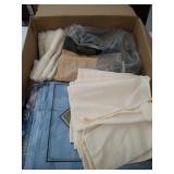 2 boxes of tableclothes, placemats, napkin rings