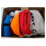 many hats, cozees, mugs, fly swatters, rulers -