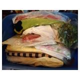 tote of table linens and napkin rings