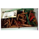 tote of Lincoln Logs and Tinkertoys