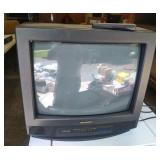 small Sharp TV with remote