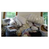 12 bags of linens, pillows, blankets, towels and