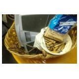 basket with 2 bathroom scales, and clothes pins