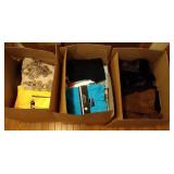 3 medium size boxes of Women