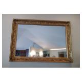 golden framed mirror (above fireplace)