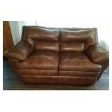 Brown leather loveseat by Super Creation Ltd.