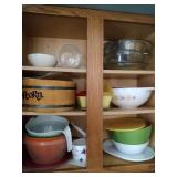 contents of cupboard - Pyrex colored bowls and