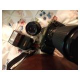 Canon T70 camera with lenses, flash and bag