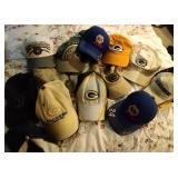 13 ball caps including Brewers, Packers and NASCAR