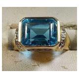 10k yg Ring with blue Topaz, 5.7 grams, size 7