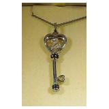 Necklace and key pendant, 8.1 grams,