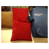 cloth clothes hamper and 3 decor pillows