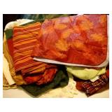 lot of placemats, table runners, and table clothes