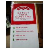 6.5 foot pre-lit silver tinsel Christmas tree 6.5 foot pre-lit silver tinsel Christmas tree