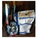 Grilling tools, some charcoal and wood chips Grilling tools, some charcoal and wood chips