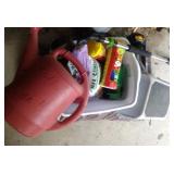 gardening lot - bag of mulch, watering can, plant