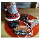 3 lited trains, standing Santa (heavy) and red