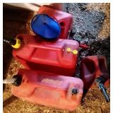 4 gas cans and some funnels - 5 gallon is 15 inch 4 gas cans and some funnels - 5 gallon is 15 inch