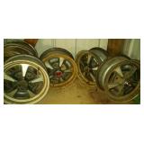 set of 4 PMD mags 15 inch, 2 with hub covers, 5 set of 4 PMD mags 15 inch, 2 with hub covers, 5