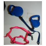 pair of retractable leashes and harness