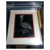 Pelican wall hanging and old newspapers Pelican wall hanging and old newspapers