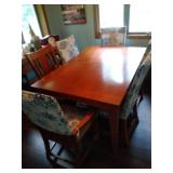 Dining table, 6 chairs, leaf and chair covers Dining table, 6 chairs, leaf and chair covers