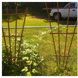 2 wood trellises