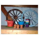2 wagon wheels and 12 terra cotta pots 2 wagon wheels and 12 terra cotta pots