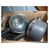 2 cast iron skillets and Wearever cookware